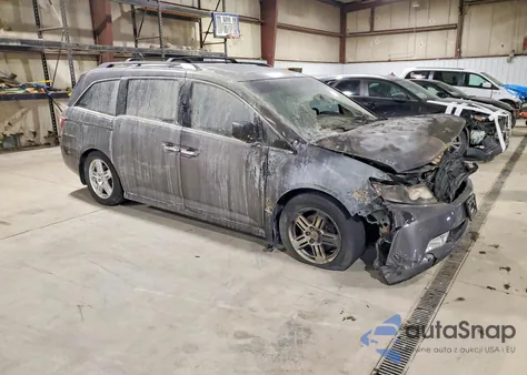 2012 Honda Odyssey Touring z USA, uszkodzony, nr VIN 5FNRL5H97CB014305